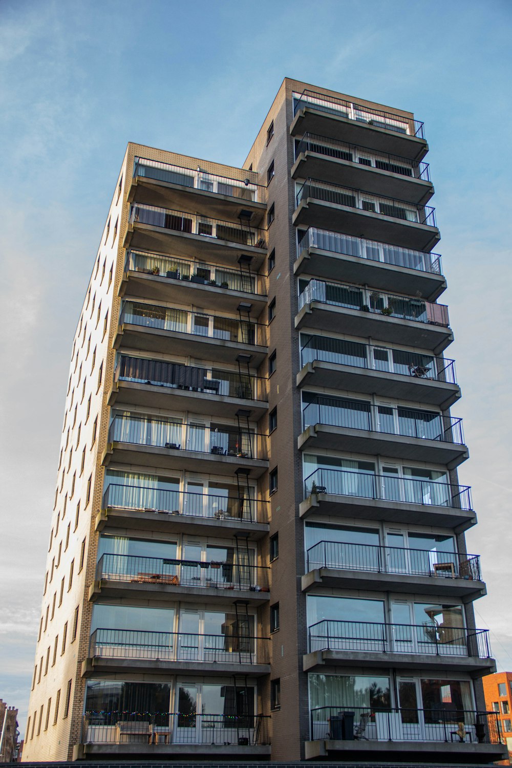 a tall building with balconies and balconies on the balconies