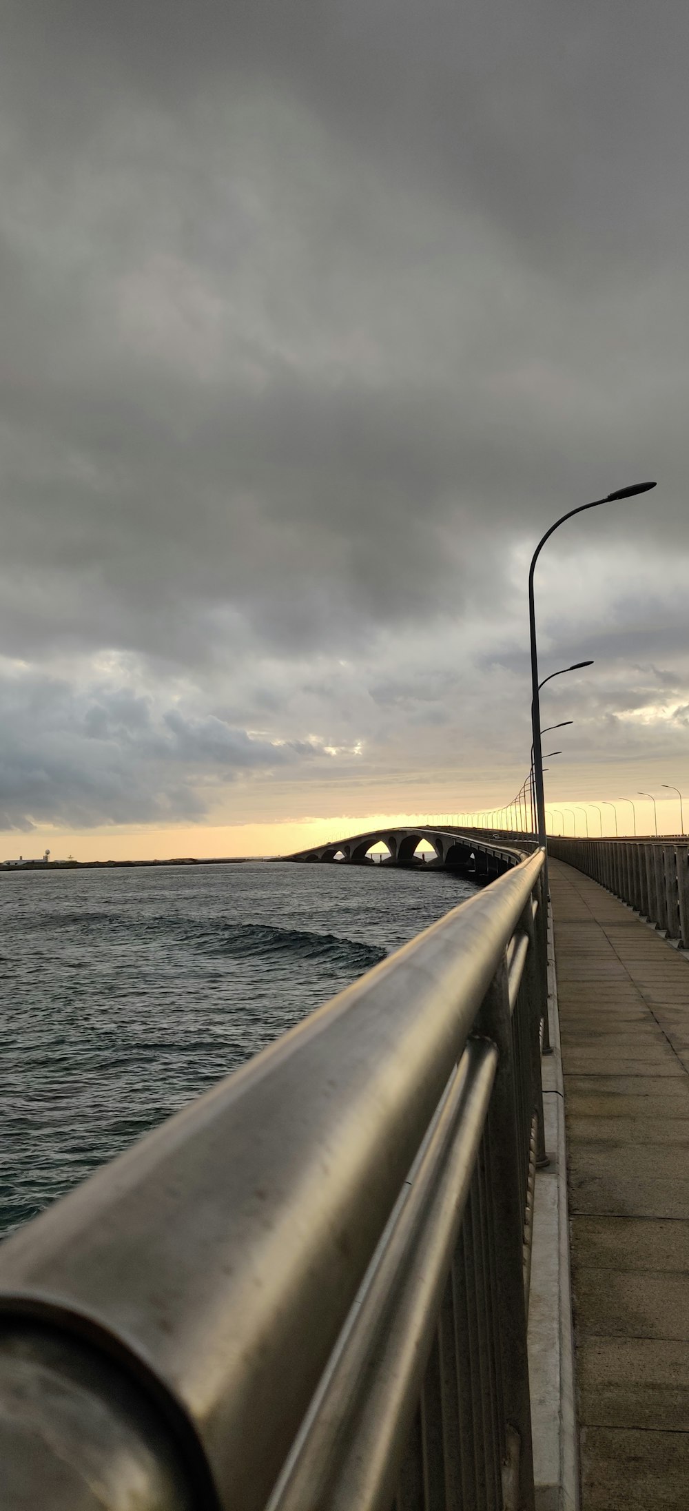 a view of a bridge over a body of water