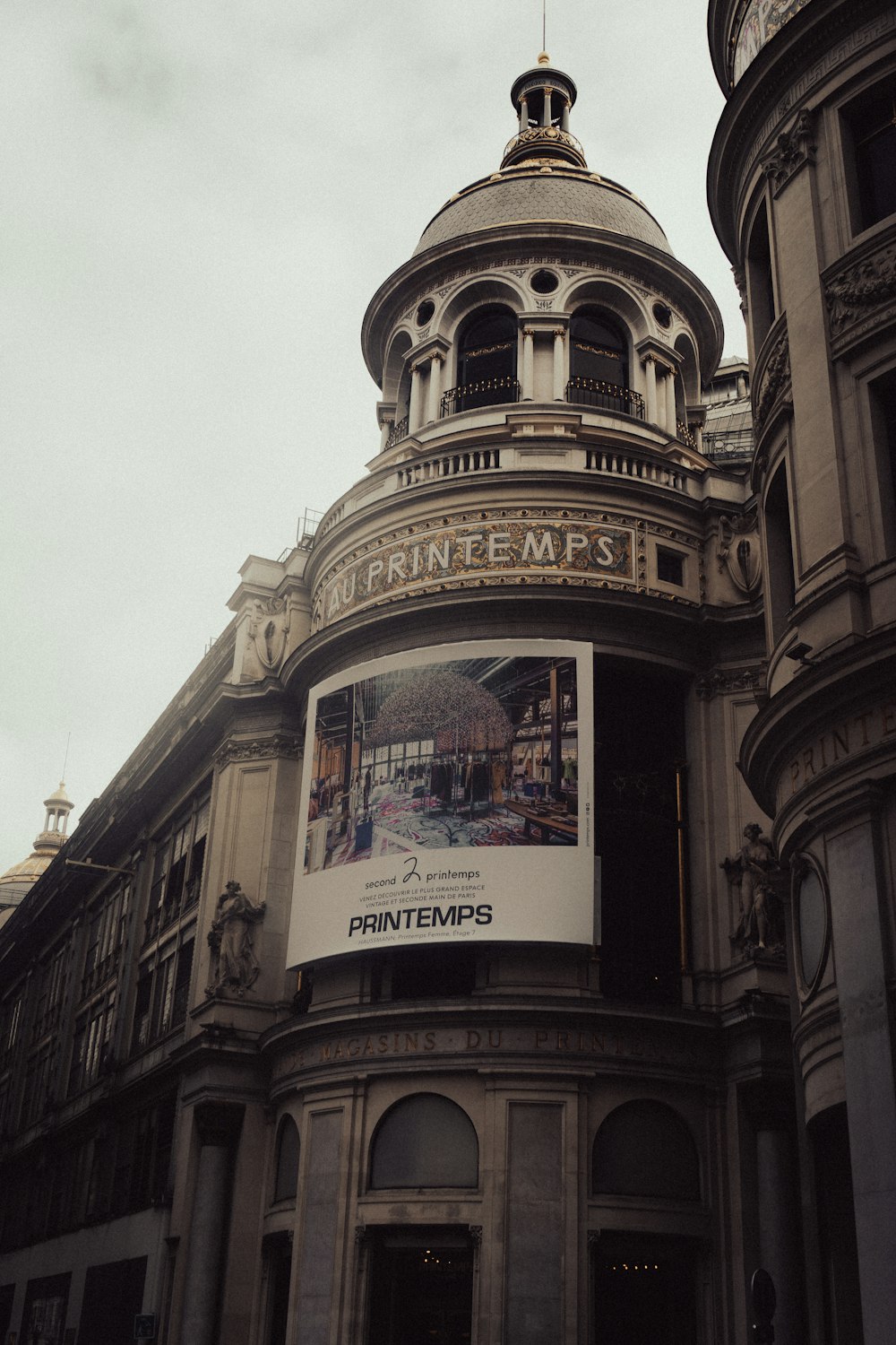 a building with a large advertisement on the front of it