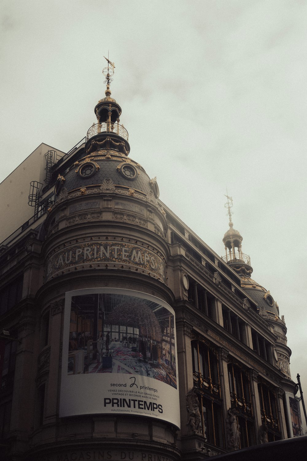 a large building with a clock on the top of it