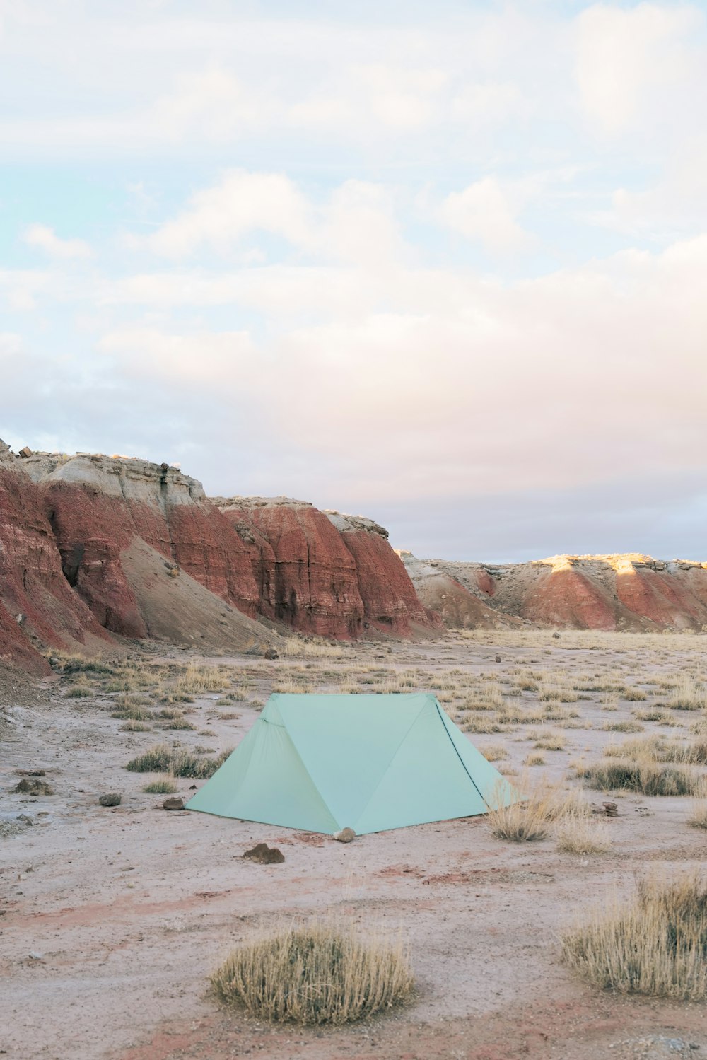 a tent in the middle of a desert