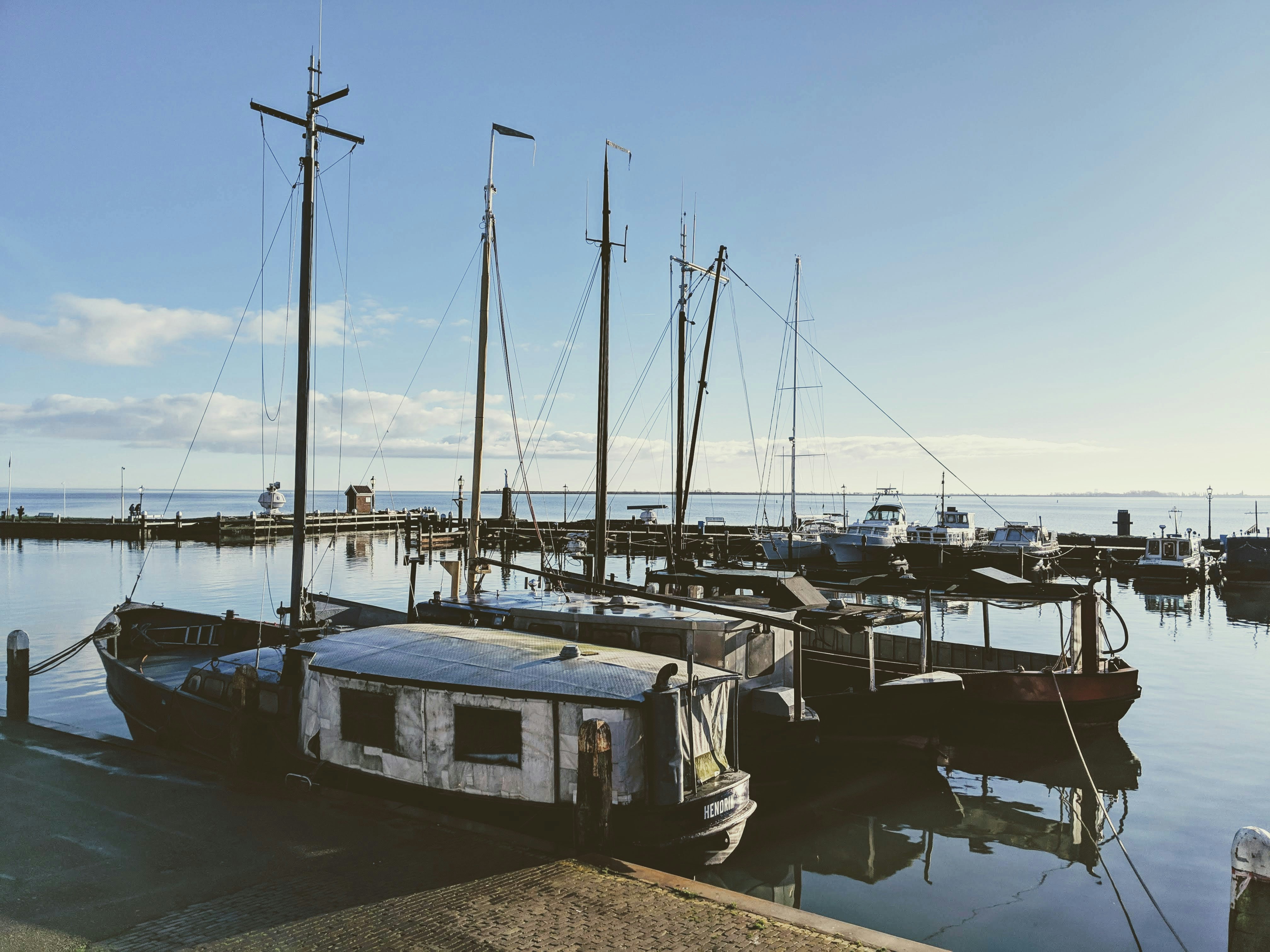 a group of boats that are sitting in the water