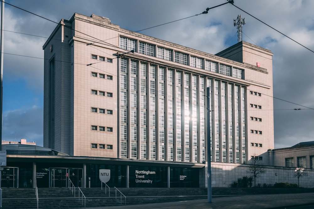 a tall building with a sky background