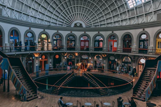 the inside of a large building with a spiral staircase
