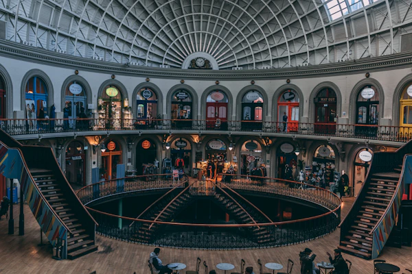 the inside of a large building with a spiral staircase