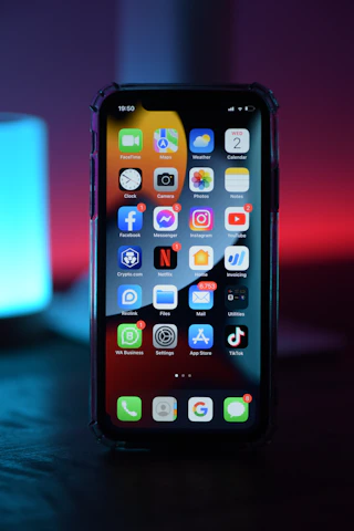 A vibrant, modern social network interface displayed on a smartphone with smooth animations and a blue-white gradient theme.