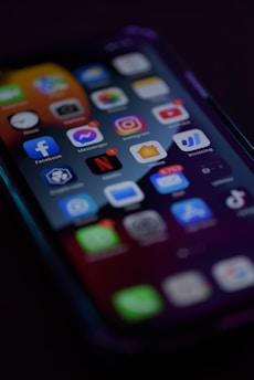 a close up of a cell phone on a table