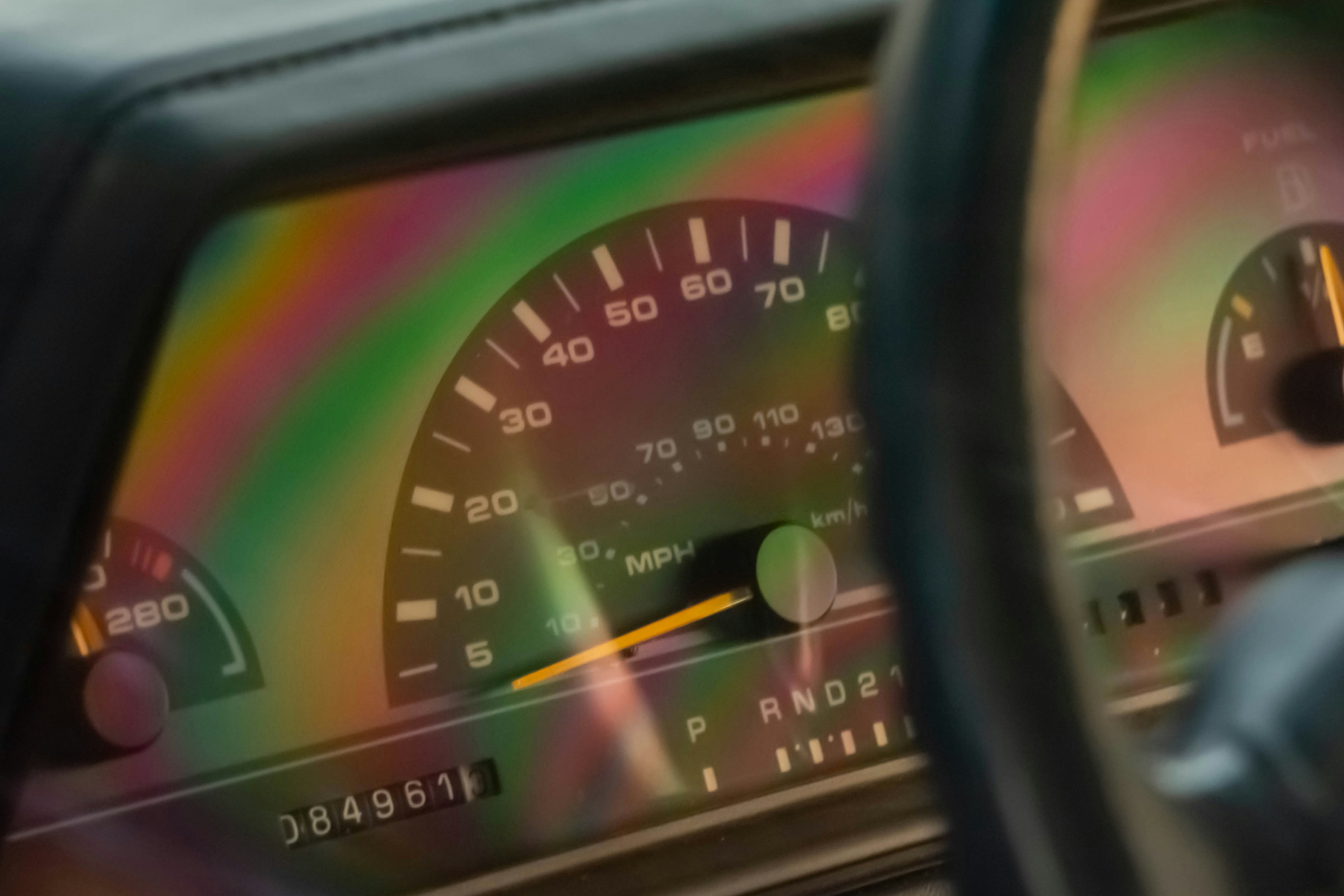 A car dashboard with a speedometer and other gauges photo Free Car Image on Unsplash