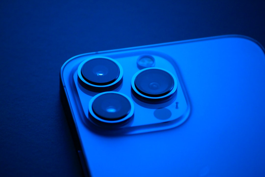 a close up of a cell phone with buttons, iPhone 13 Pro in Sierra Blue