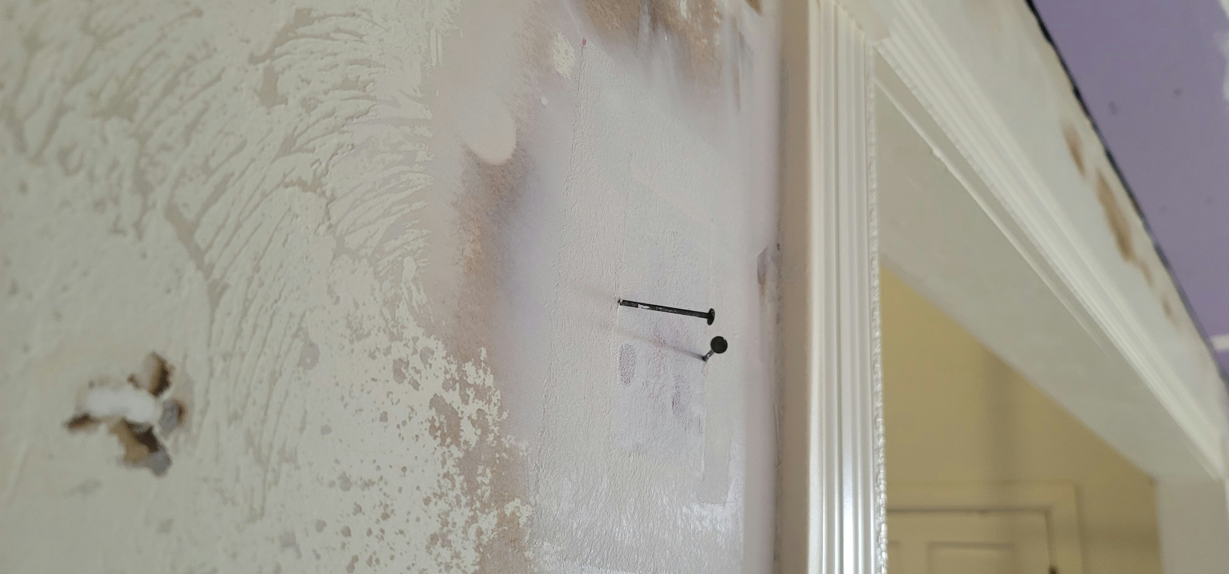 a white door with a black handle on it