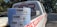 Two rolls of Fibafuse Max drywall tape are placed on the open tailgate of a white pickup truck. The truck has a logo with red text on the side. In the background, there are trees and another vehicle is visible.