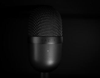a close up of a microphone in the dark