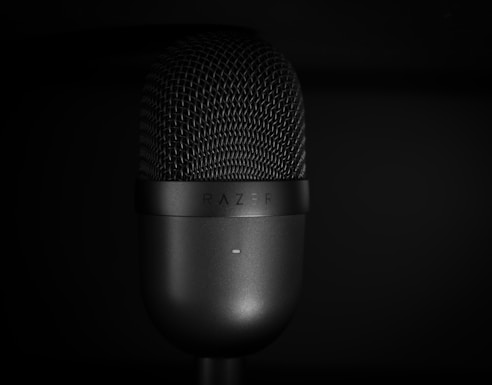 a close up of a microphone in the dark