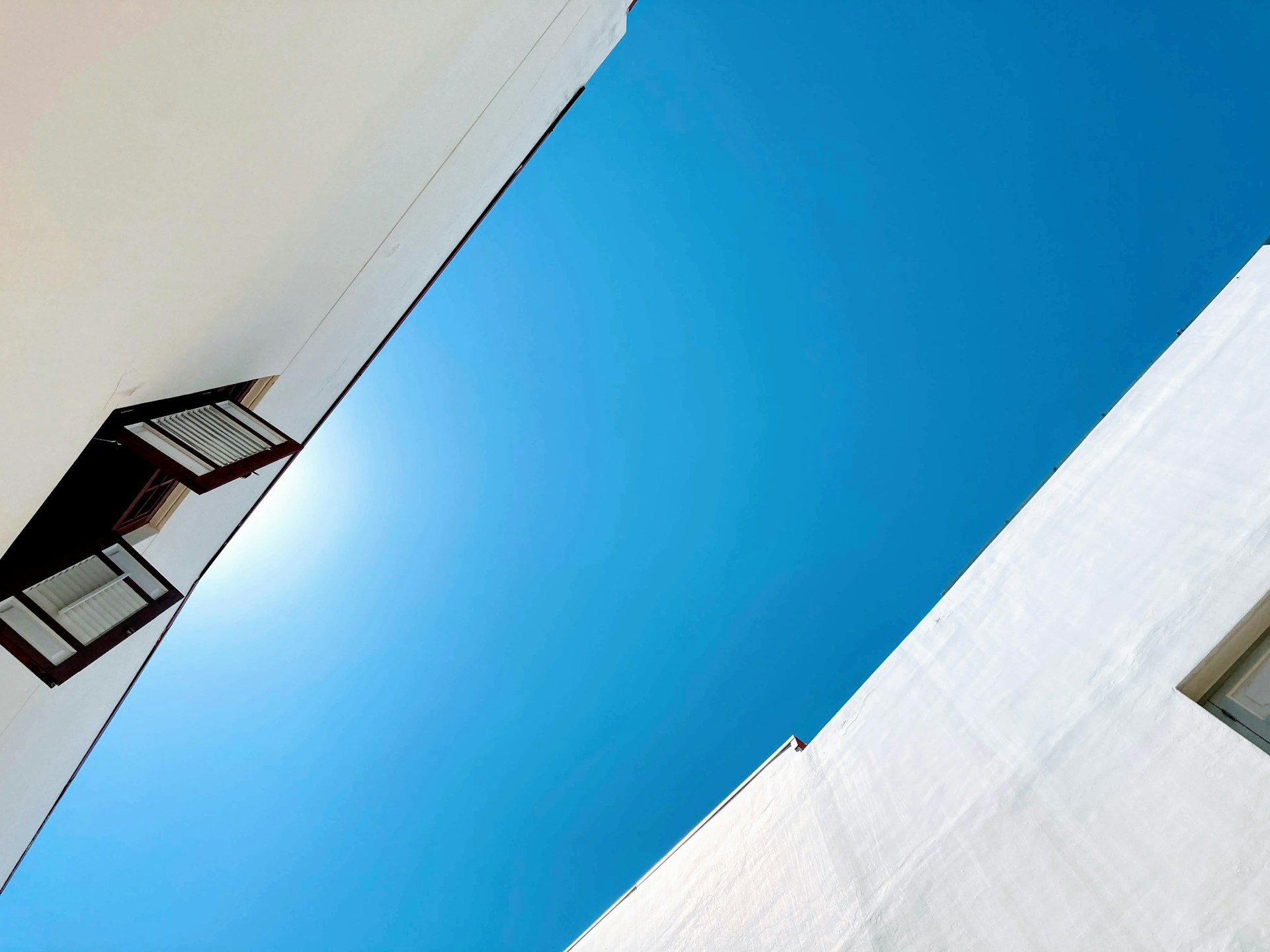 a tall building with a clock on the side of it