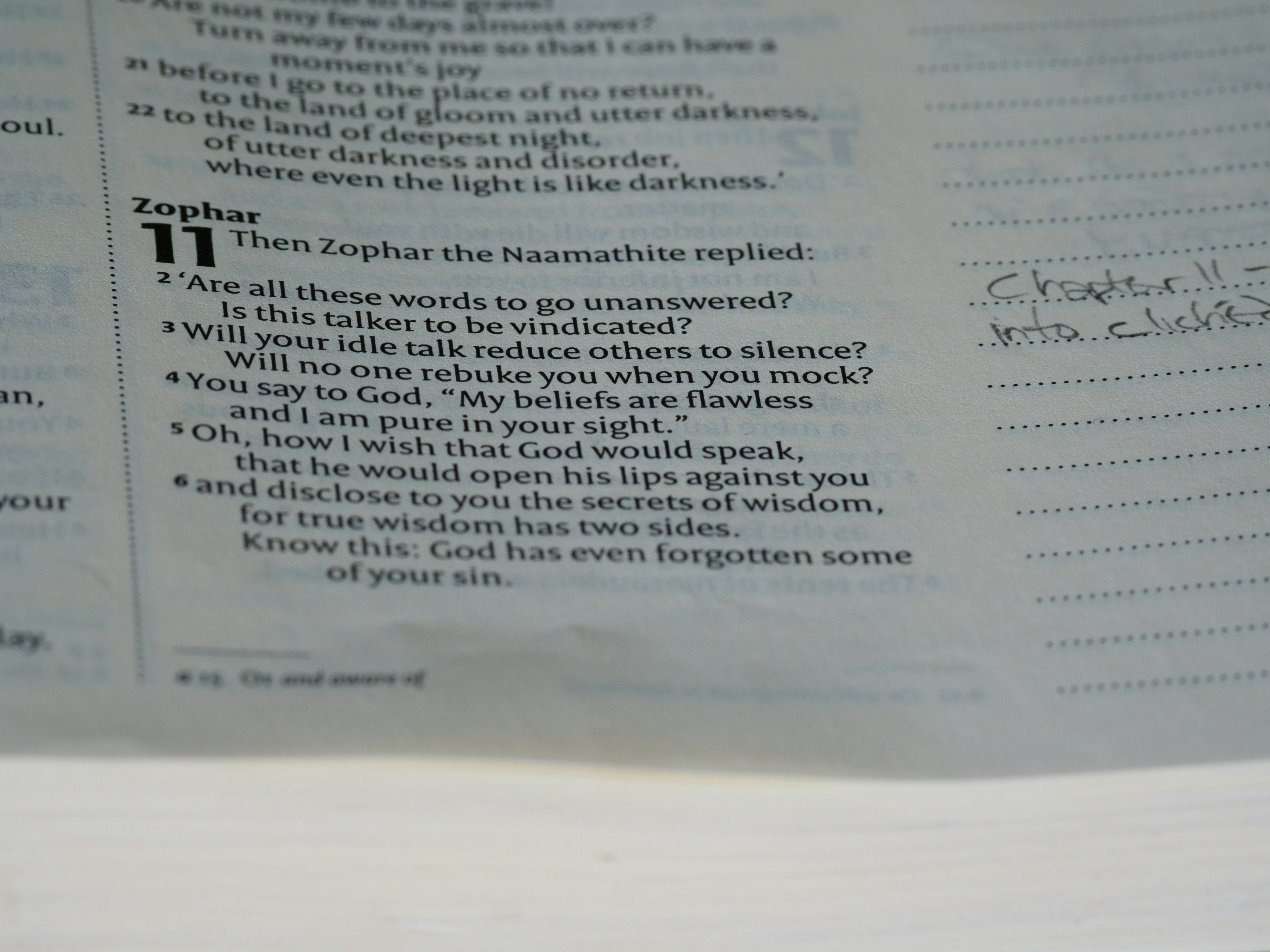 a close up of a book with writing on it (Photo by Brett Jordan on Unsplash)