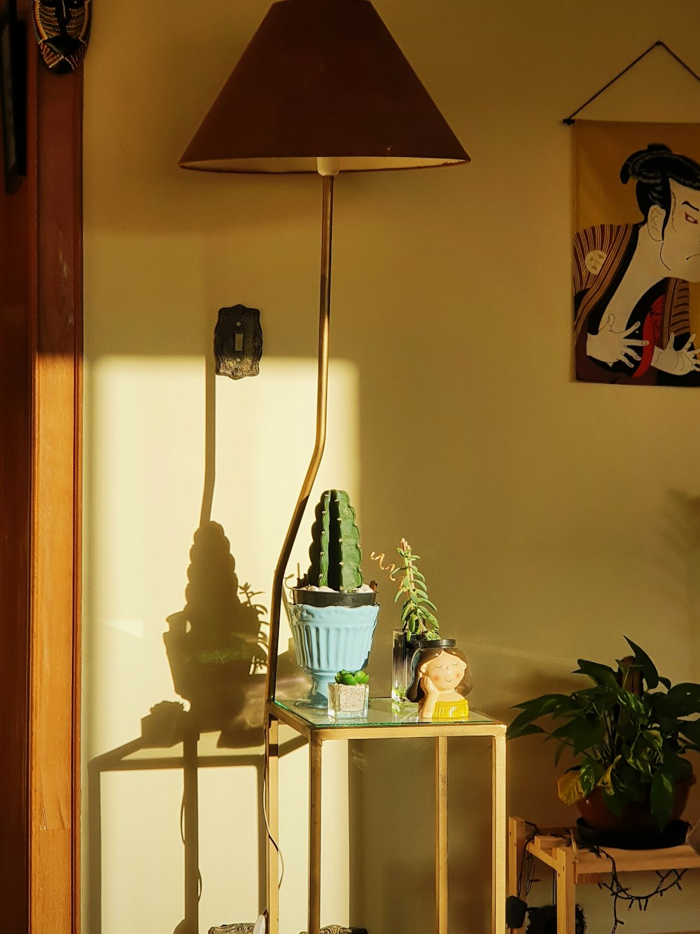 a lamp that is on a table in a room