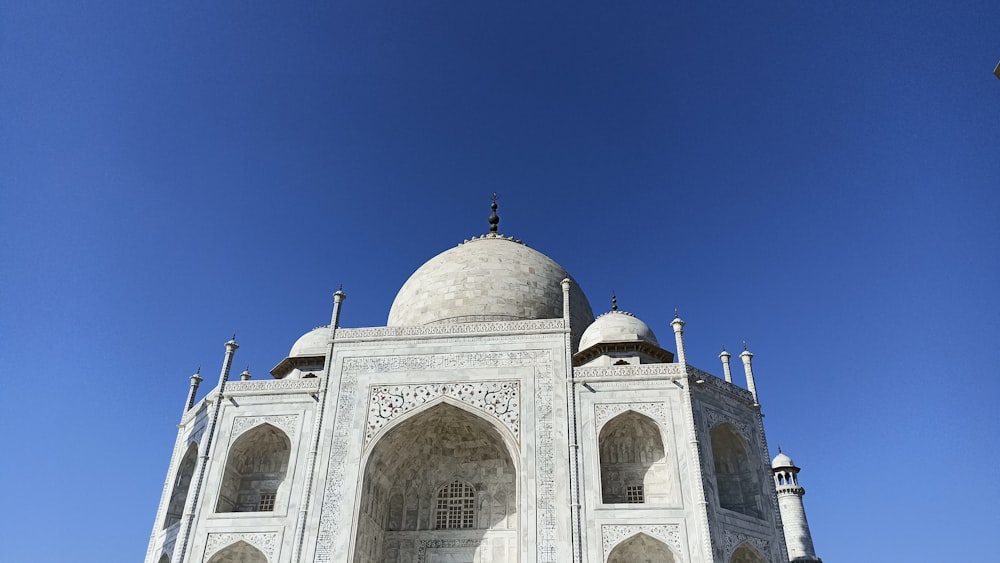 a large white building with a sky background