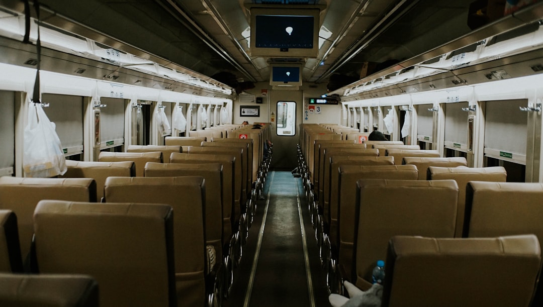 a train car filled with lots of empty seats,