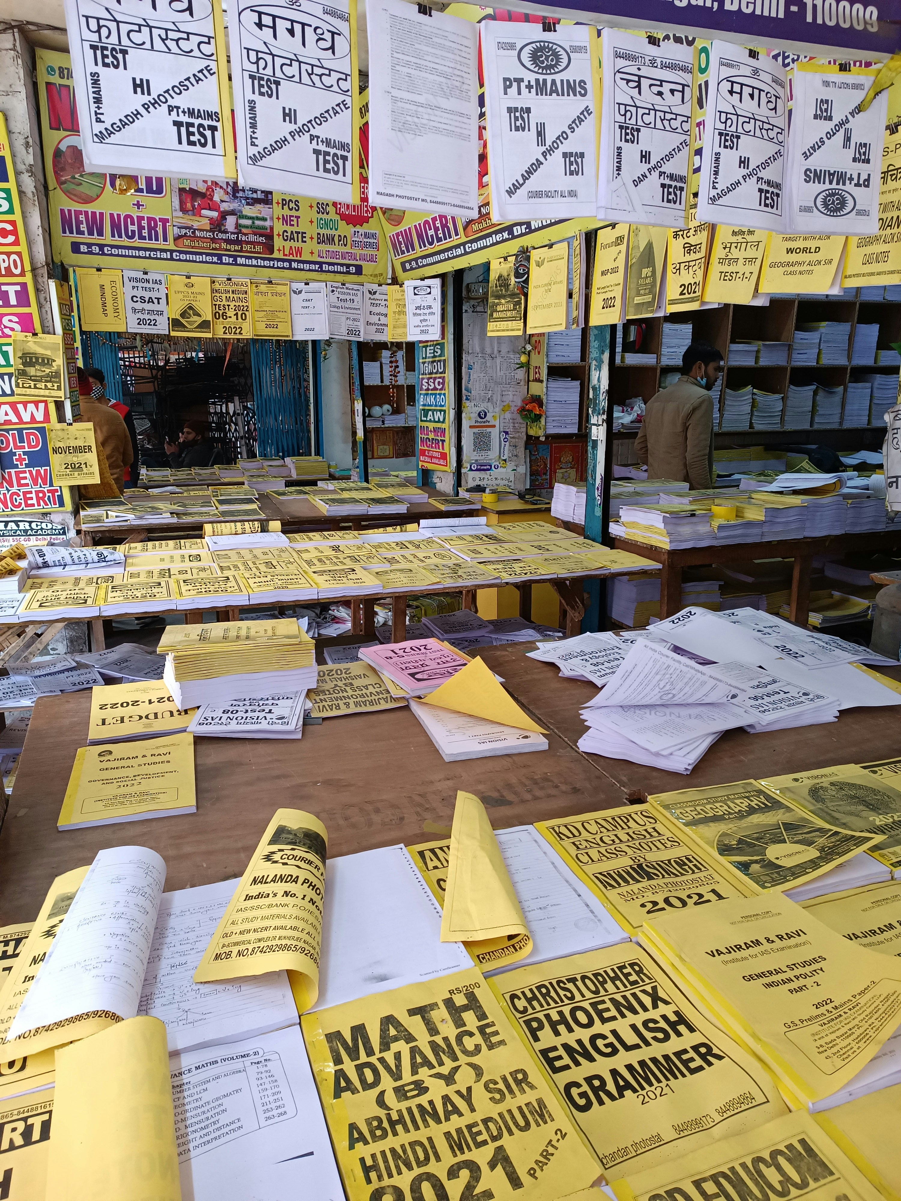 a bunch of yellow papers are on a table