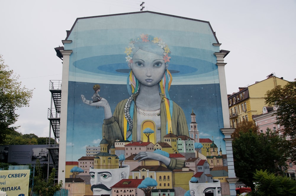 a large mural on the side of a building