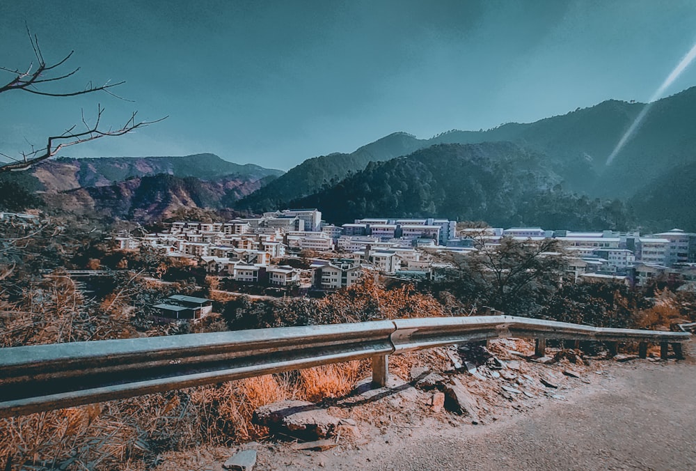 a view of a city with mountains in the background