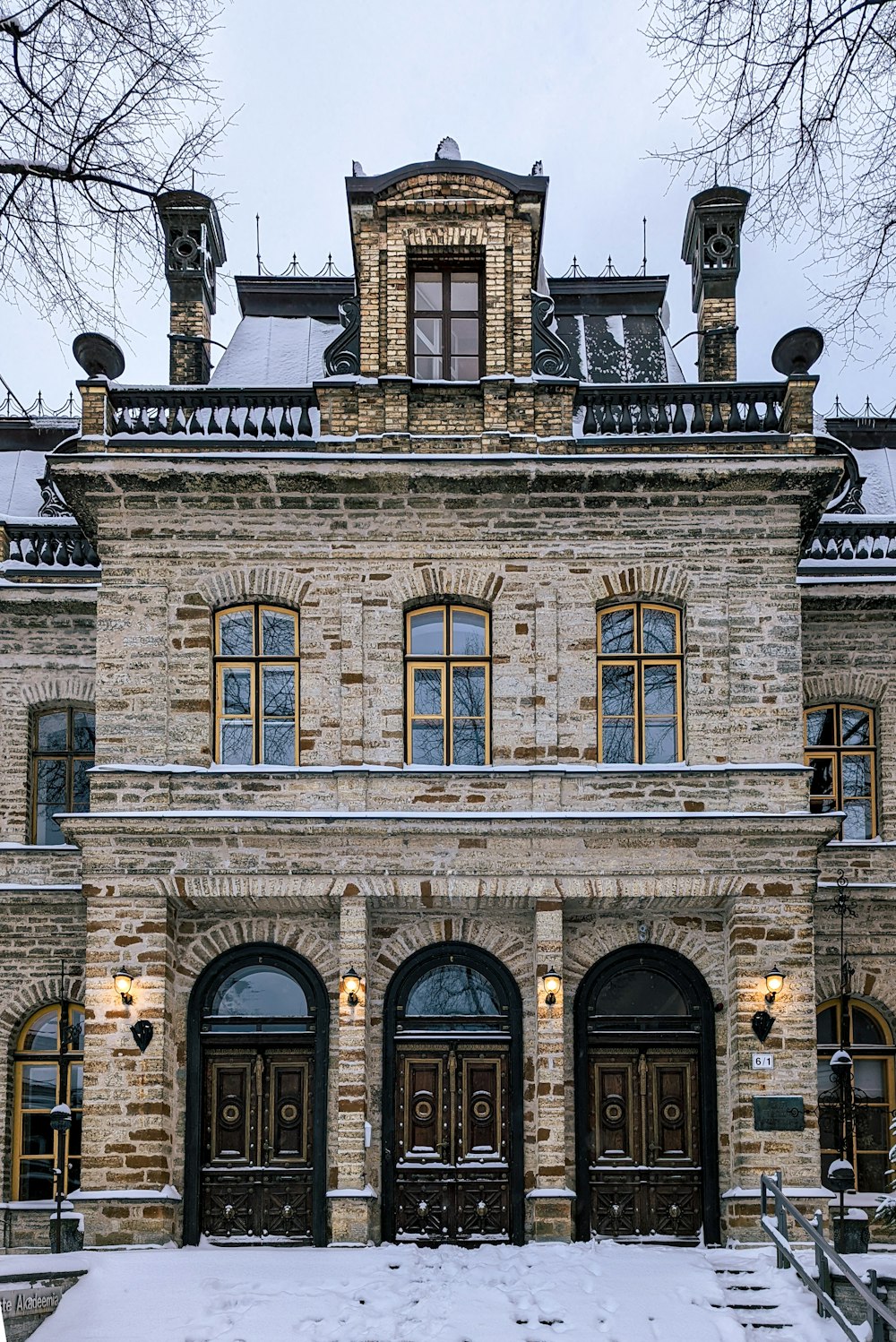 a large stone building with a clock tower on top of it