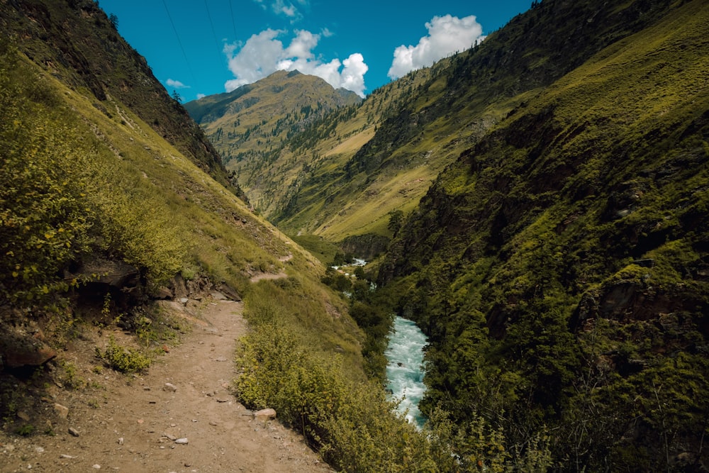 a view of a river running through a valley