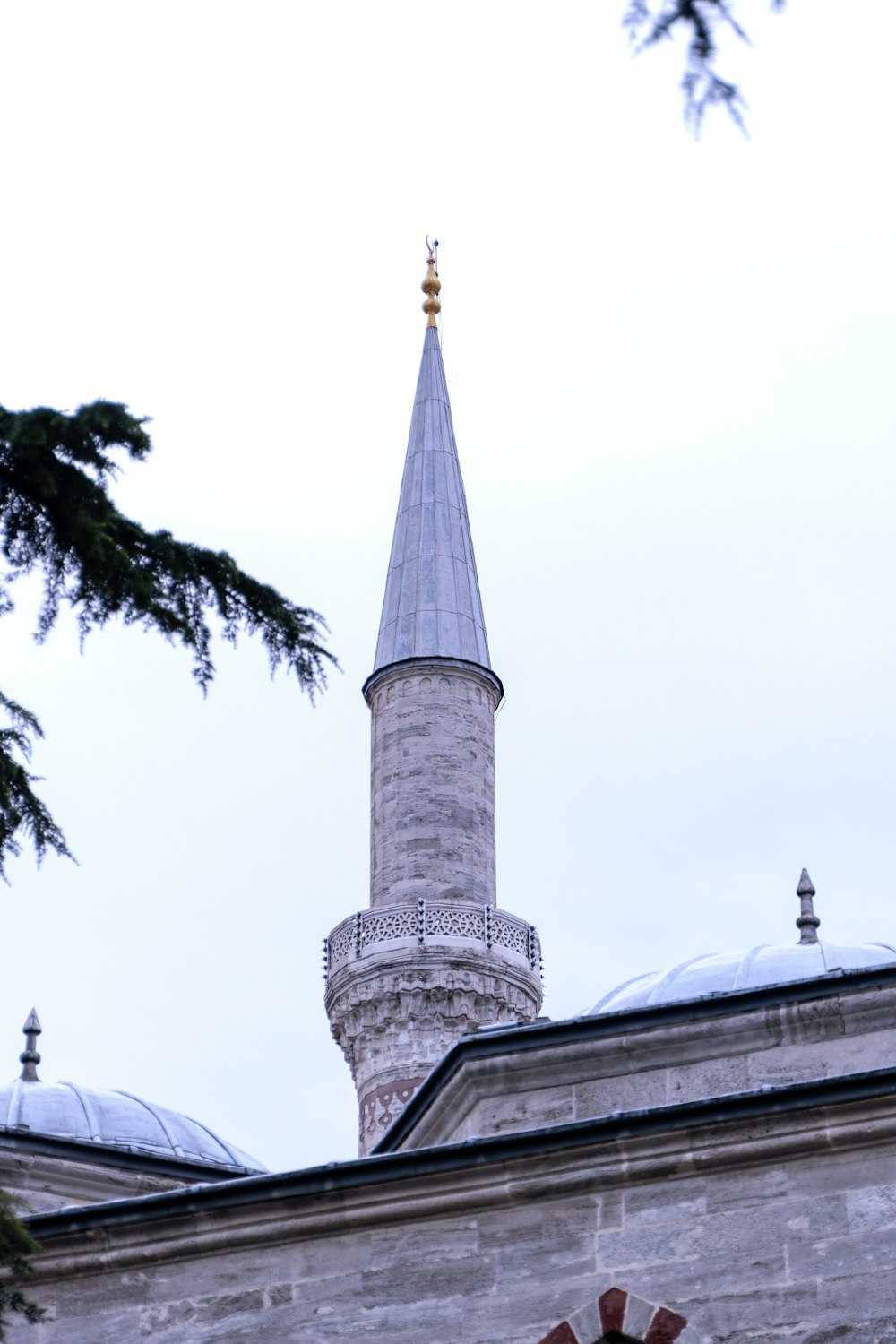 a tall building with a clock on it's side