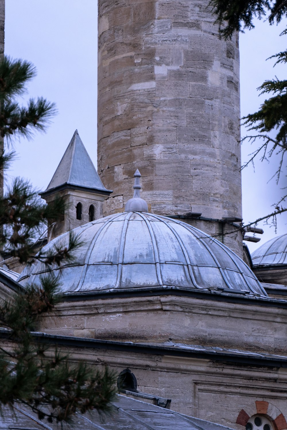 a tall tower with a clock on top of it