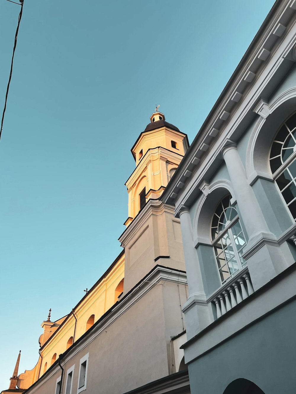 a tall building with a clock on the top of it