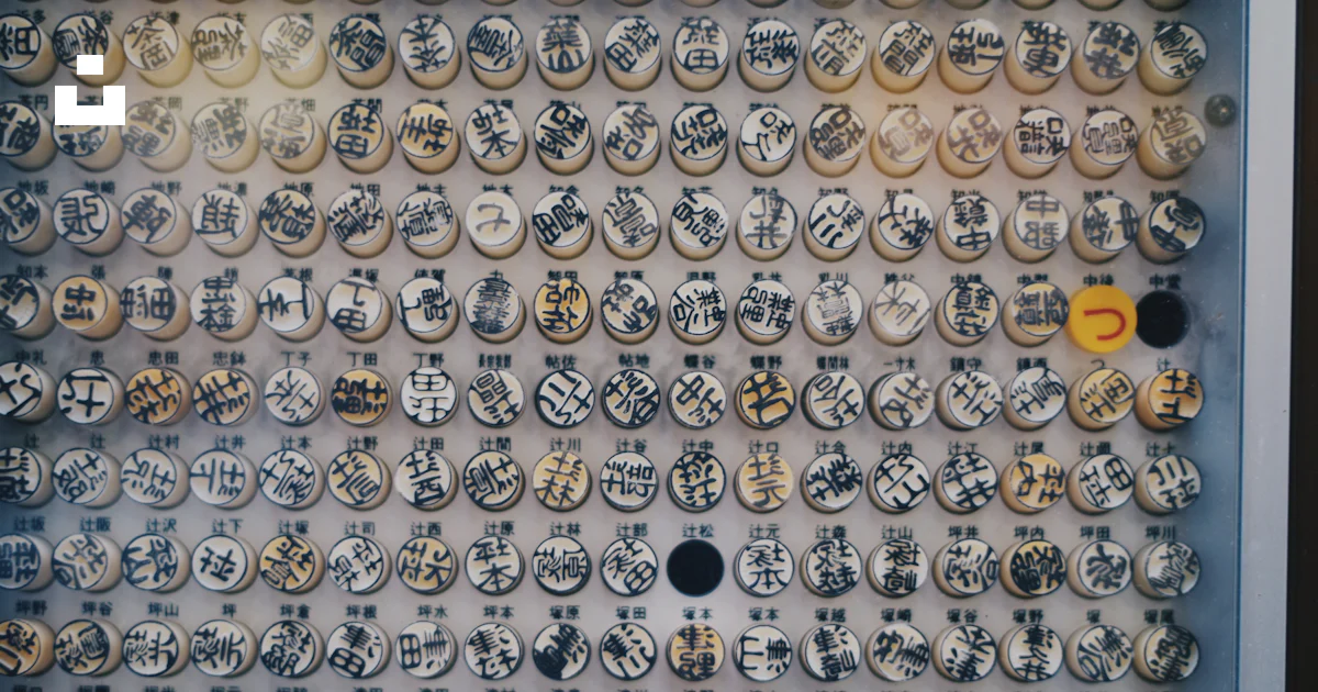 Photo Button Asian A display of buttons with asian writing on them photo – Free Grey Image ...