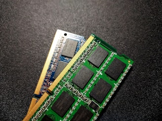 a close up of two memory cards on a table