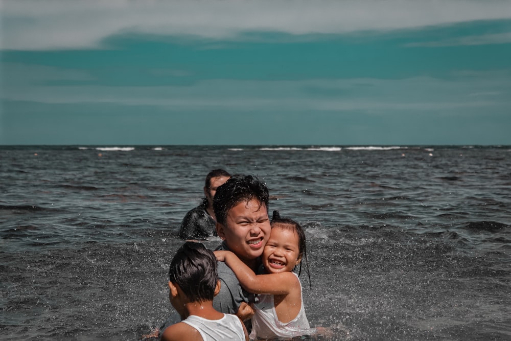 a group of people are in the water