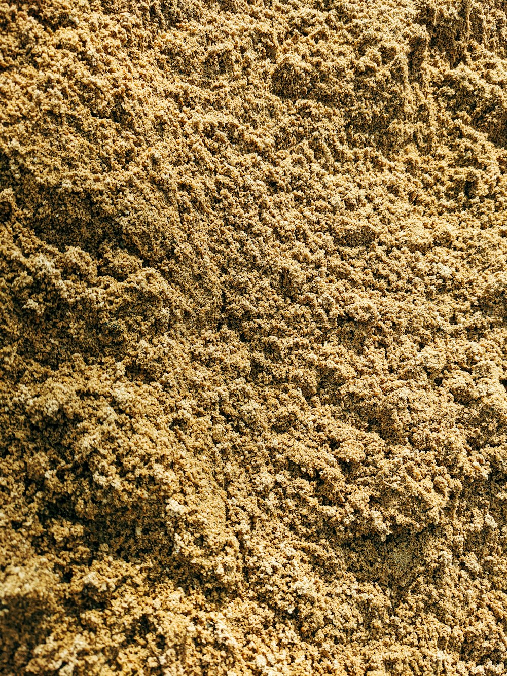 a close up view of a dirt surface