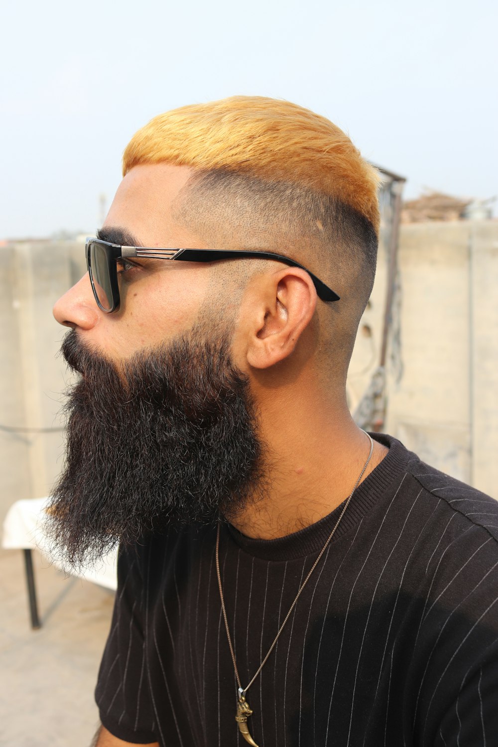 a man with a long beard and sunglasses