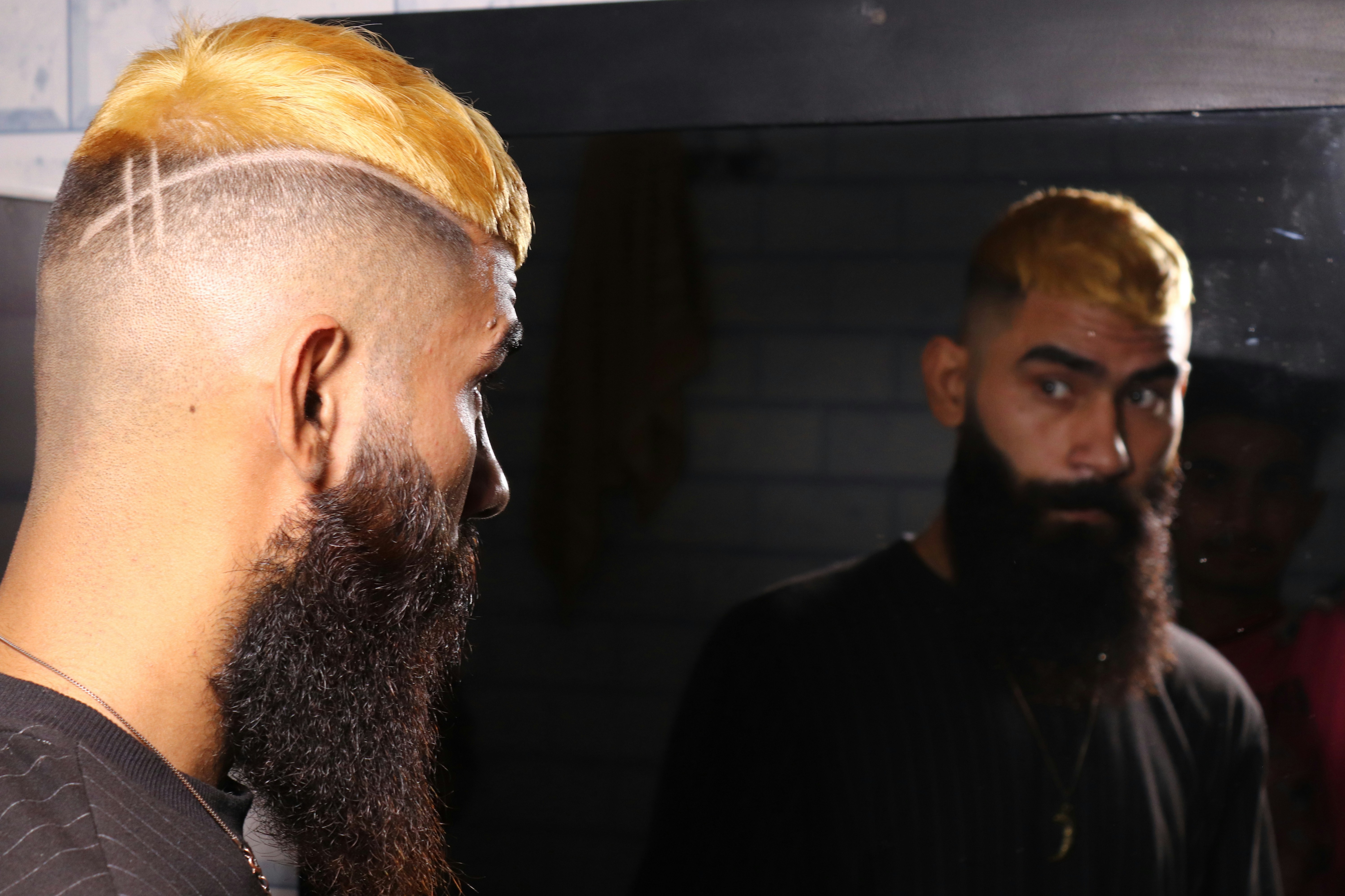 a man with a long beard and a bald head