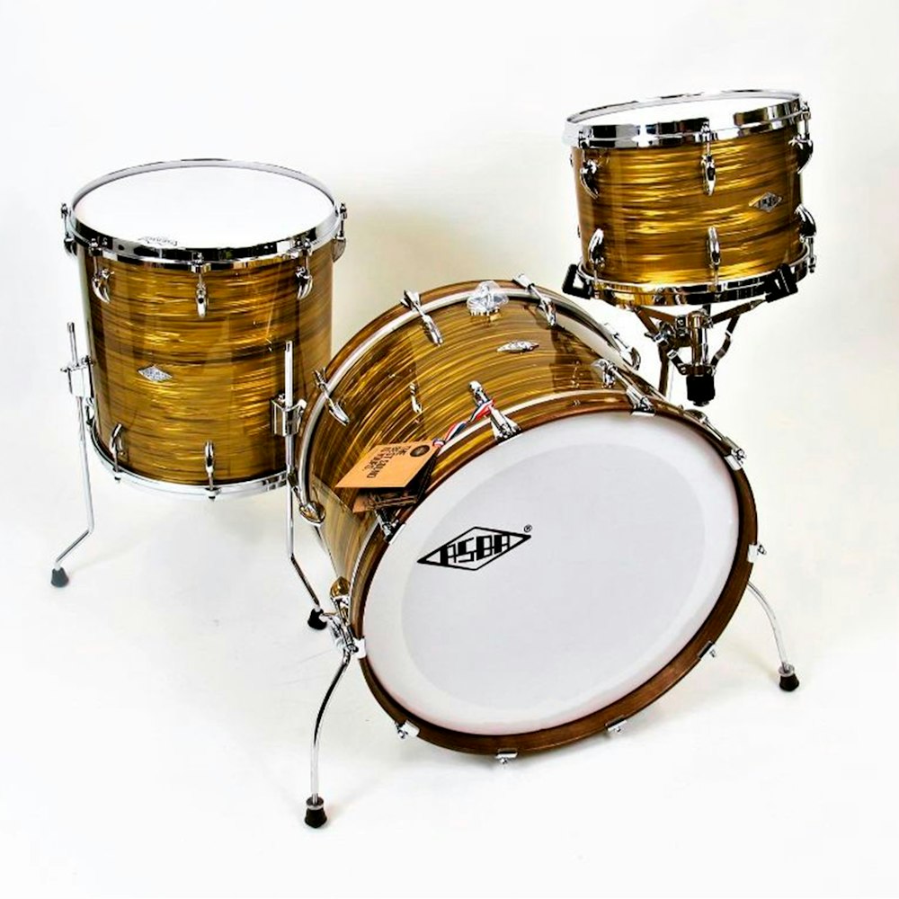 a close up of a drum set on a white background