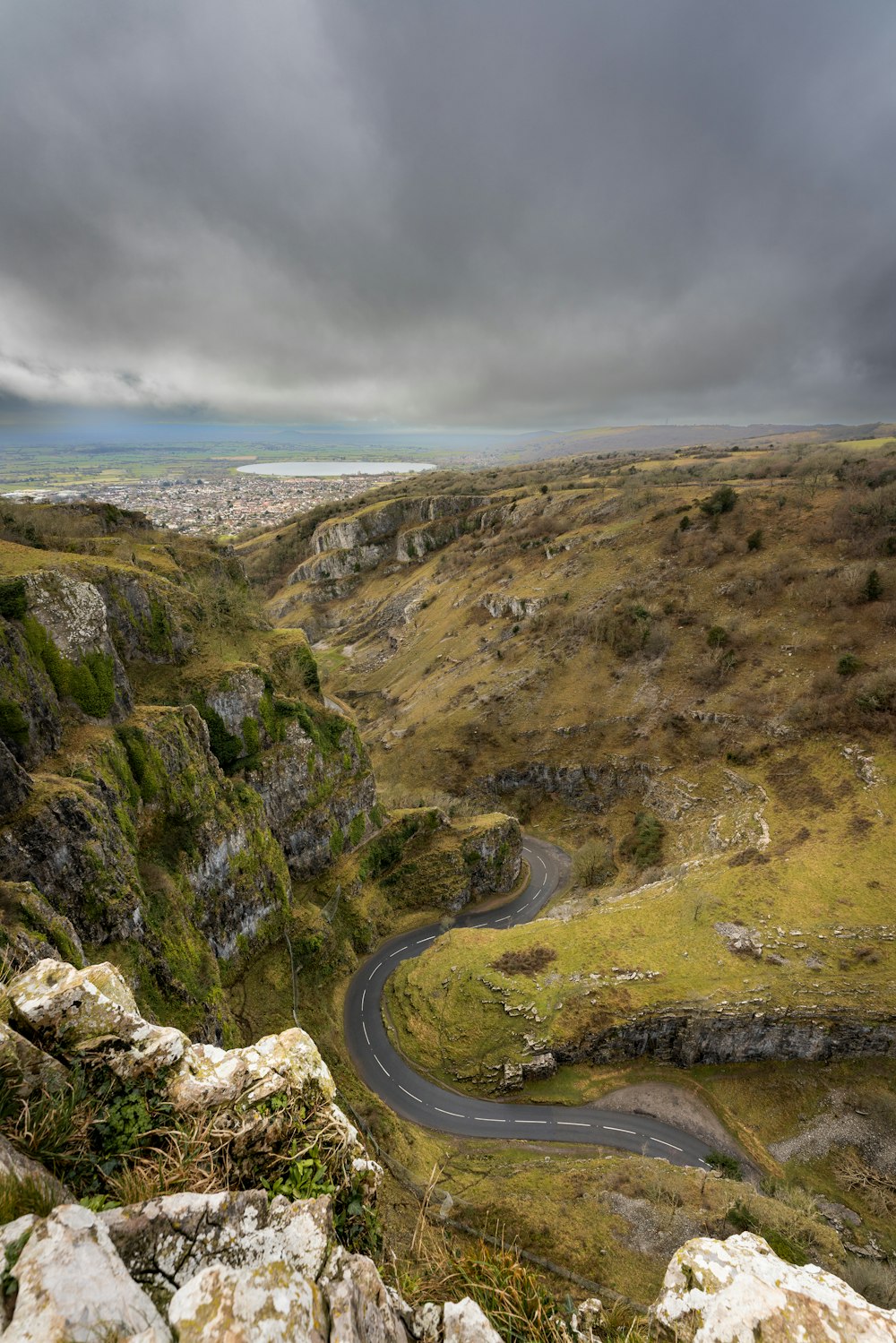 a winding road in the middle of a valley