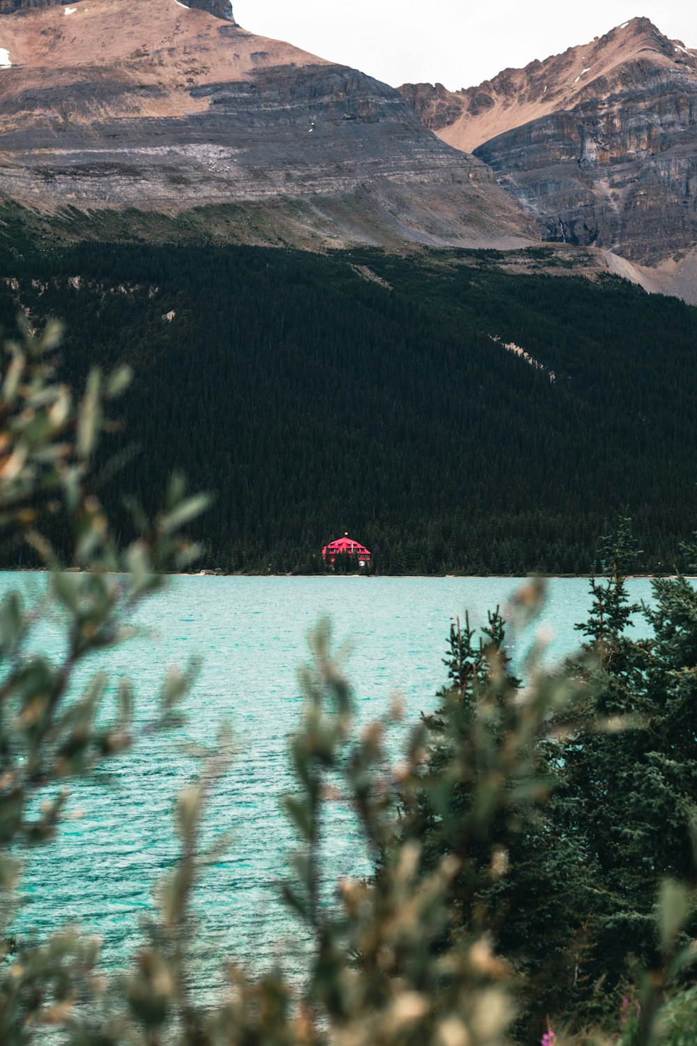 a lake with mountains in the background