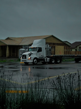 a semi truck parked in a parking lot