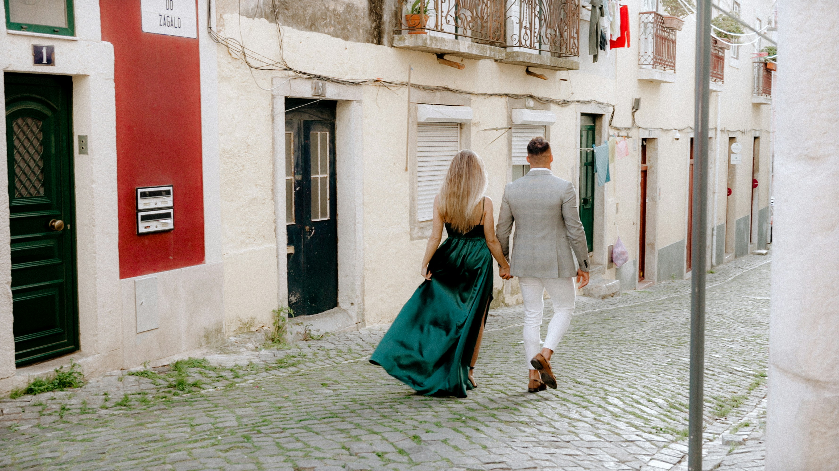 couple wandering through the charming streets of a historic city - vacation ideas for new couples