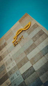 the egyptian symbols are on the wall of the building