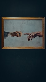 a painting of two hands reaching out to touch each other