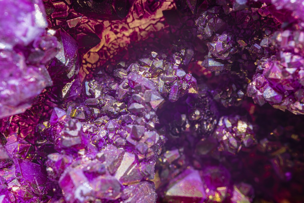 a close up of a bunch of purple crystals