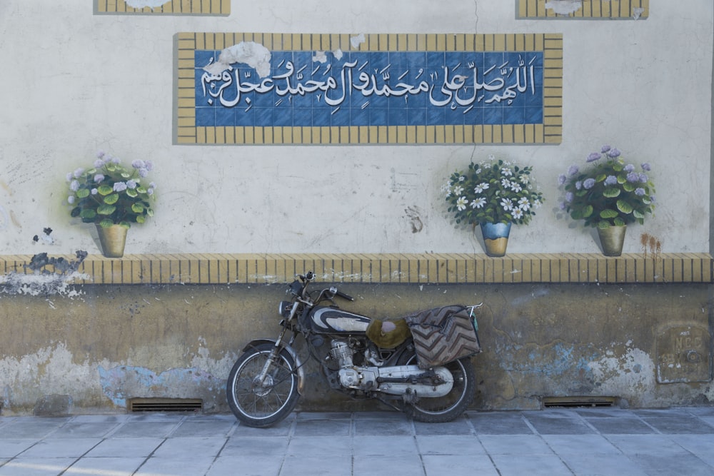 a motorcycle parked in front of a building