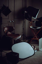 Cozy corner of the studio with props and backdrops arranged neatly.