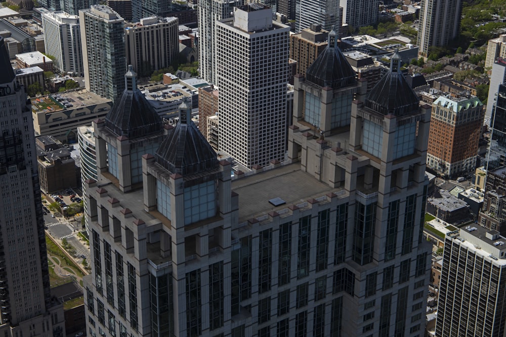 an aerial view of a city with tall buildings