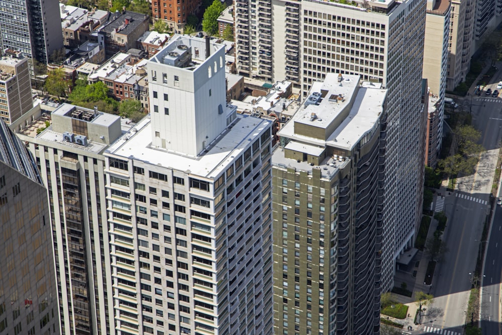 an aerial view of a city with tall buildings