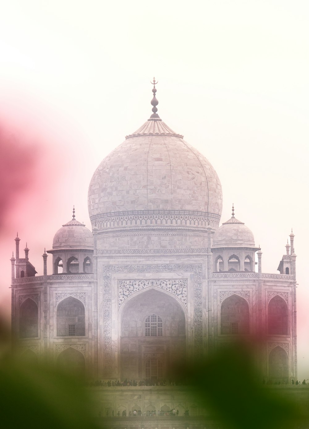 a large white building with a dome on top of it