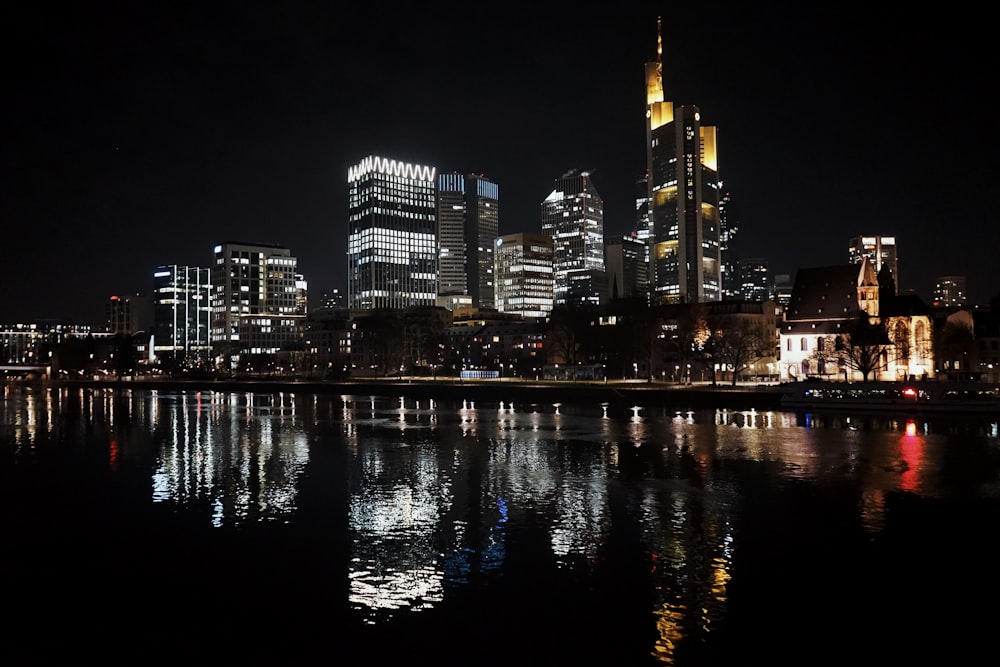 a view of a city at night from across the water